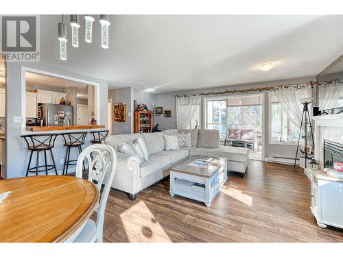 1780 Atkinson Street Unit# 208, Penticton, BC - Indoor Photo Showing Living Room With Fireplace