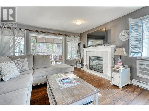 1780 Atkinson Street Unit# 208, Penticton, BC - Indoor Photo Showing Living Room With Fireplace