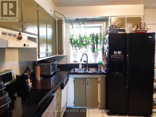 33 Pakenham Drive, Toronto (Rexdale-Kipling), ON - Indoor Photo Showing Kitchen With Double Sink