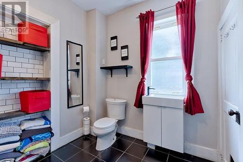 MAIN FLOOR BATHROOM/ LAUNDRY - 479 Draper Street, Pembroke, ON - Indoor Photo Showing Bathroom