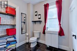 MAIN FLOOR BATHROOM/ LAUNDRY - 