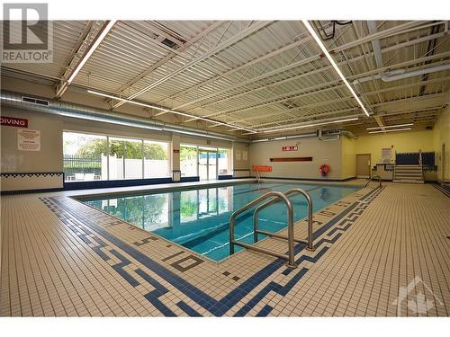 2000 Jasmine Crescent Unit#307, Ottawa, ON - Indoor Photo Showing Other Room With In Ground Pool