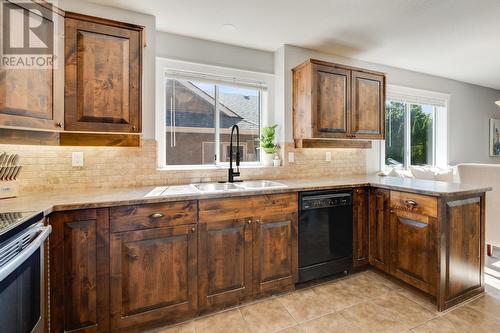 662 Southwind Drive, Kelowna, BC - Indoor Photo Showing Kitchen With Double Sink