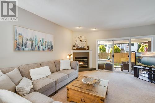 662 Southwind Drive, Kelowna, BC - Indoor Photo Showing Living Room With Fireplace