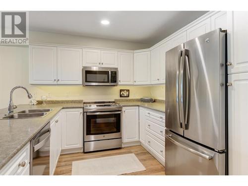 710 Rutland Road N Unit# 108, Kelowna, BC - Indoor Photo Showing Kitchen With Double Sink