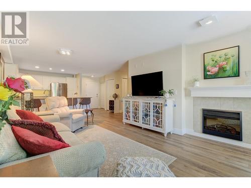 710 Rutland Road N Unit# 108, Kelowna, BC - Indoor Photo Showing Living Room With Fireplace