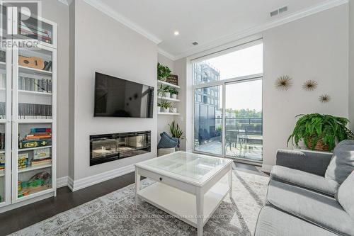 201 - 1880 Gordon Street, Guelph, ON - Indoor Photo Showing Living Room With Fireplace