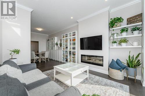 201 - 1880 Gordon Street, Guelph (Clairfields), ON - Indoor Photo Showing Living Room With Fireplace