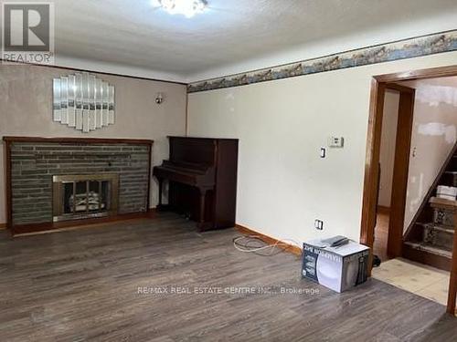 6648 Dunn Street, Niagara Falls, ON - Indoor With Fireplace