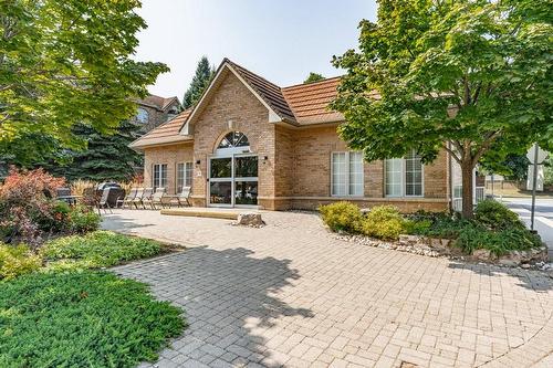 Outdoor barbecue and seating area! - 216 Plains Road W|Unit #D307, Burlington, ON - Outdoor