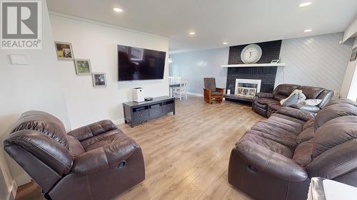 9819 114 Avenue, Fort St. John, BC - Indoor Photo Showing Living Room With Fireplace