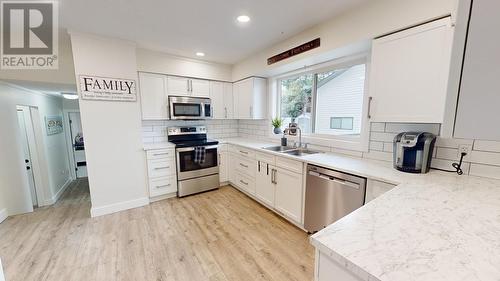 9819 114 Avenue, Fort St. John, BC - Indoor Photo Showing Kitchen With Double Sink