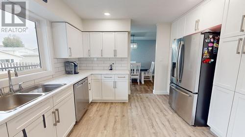 9819 114 Avenue, Fort St. John, BC - Indoor Photo Showing Kitchen With Double Sink