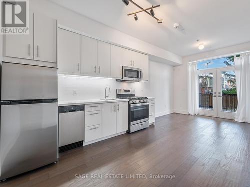 105 - 1183 Dufferin Street, Toronto (Dovercourt-Wallace Emerson-Junction), ON - Indoor Photo Showing Kitchen With Stainless Steel Kitchen