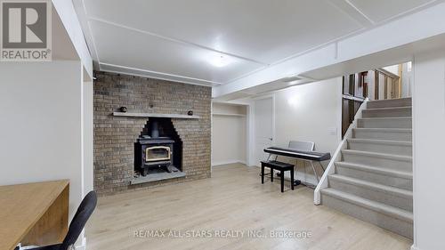 25 Fraser Avenue, Brampton (Downtown Brampton), ON - Indoor Photo Showing Other Room With Fireplace