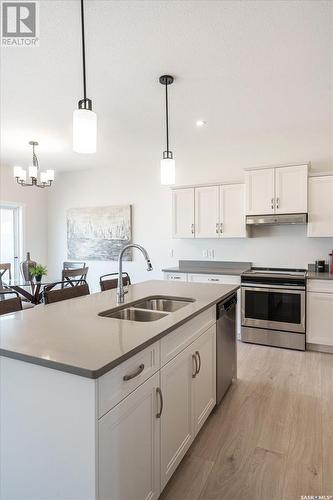 235 Asokan Street, Saskatoon, SK - Indoor Photo Showing Kitchen With Double Sink