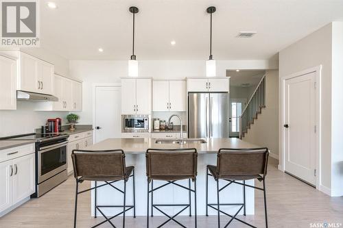 235 Asokan Street, Saskatoon, SK - Indoor Photo Showing Kitchen With Double Sink With Upgraded Kitchen