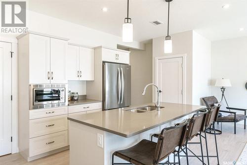 235 Asokan Street, Saskatoon, SK - Indoor Photo Showing Kitchen With Double Sink