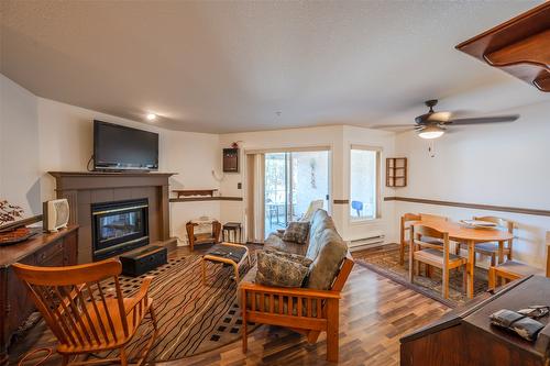 205-1750 Atkinson Street, Penticton, BC - Indoor Photo Showing Living Room With Fireplace