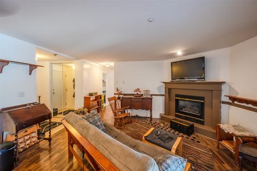 205-1750 Atkinson Street, Penticton, BC - Indoor Photo Showing Living Room With Fireplace