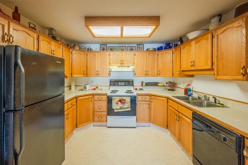 205-1750 Atkinson Street, Penticton, BC - Indoor Photo Showing Kitchen With Double Sink