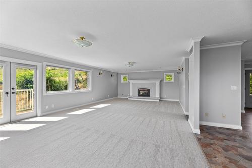 6191 Wilson Road, Peachland, BC - Indoor With Fireplace