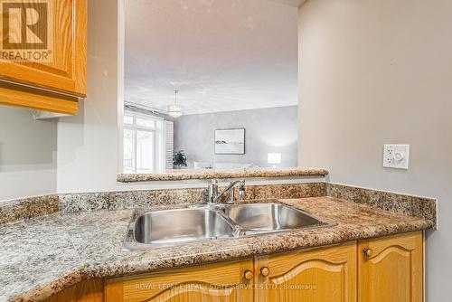 302 - 443 Centennial Forest Drive, Milton (Timberlea), ON - Indoor Photo Showing Kitchen With Double Sink