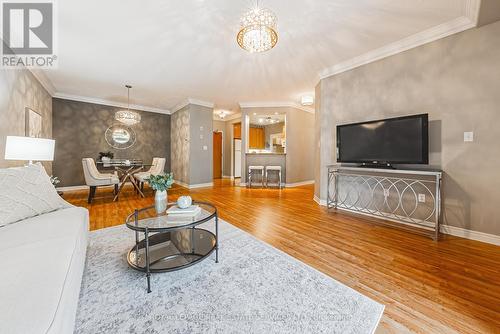 302 - 443 Centennial Forest Drive, Milton (Timberlea), ON - Indoor Photo Showing Living Room