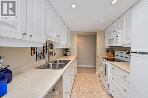 406 - 693 Windermere Road, London, ON - Indoor Photo Showing Kitchen With Double Sink