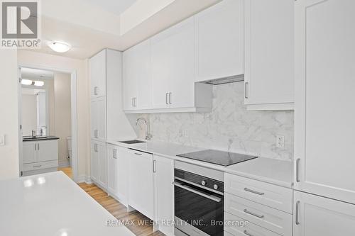 706 - 9075 Jane Street S, Vaughan, ON - Indoor Photo Showing Kitchen With Upgraded Kitchen