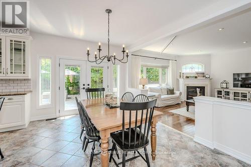 3893 Trelawny Circle, Mississauga (Lisgar), ON - Indoor Photo Showing Dining Room With Fireplace