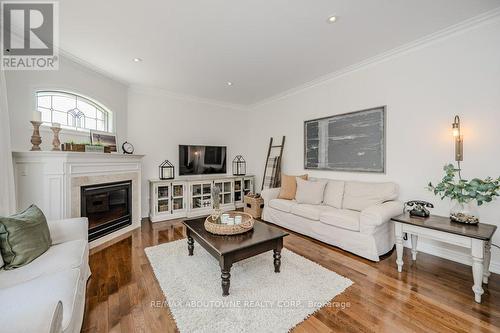 3893 Trelawny Circle, Mississauga (Lisgar), ON - Indoor Photo Showing Living Room With Fireplace