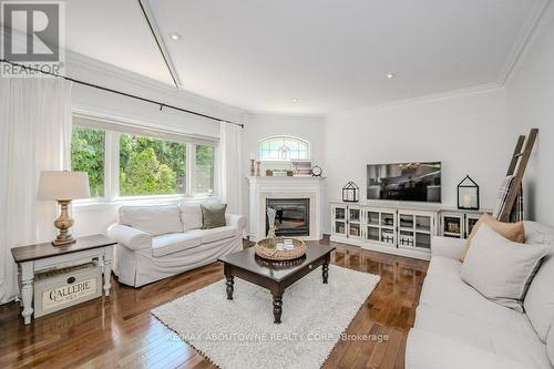 3893 Trelawny Circle, Mississauga (Lisgar), ON - Indoor Photo Showing Living Room With Fireplace