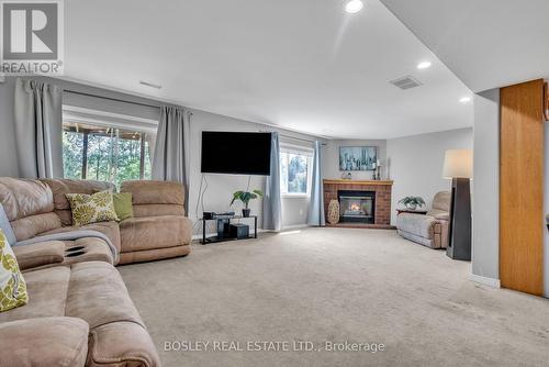 650 Clouston Road, Alnwick/Haldimand, ON - Indoor Photo Showing Living Room With Fireplace