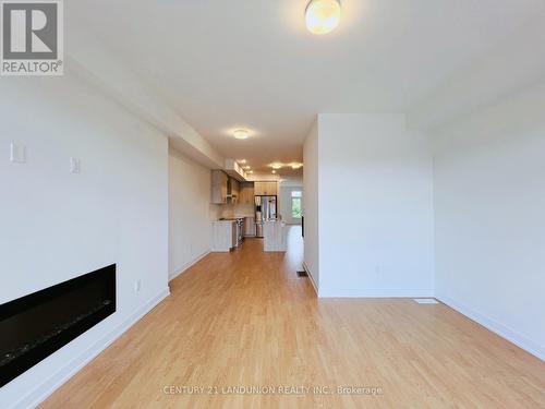 1820 Donald Cousens Parkway, Markham (Cornell), ON - Indoor Photo Showing Other Room With Fireplace