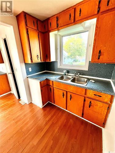 504 Stovel Avenue W, Melfort, SK - Indoor Photo Showing Kitchen With Double Sink