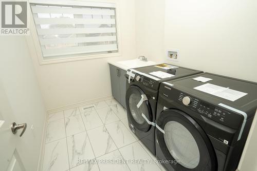 20 Hummingbird Grove, Adjala-Tosorontio (Colgan), ON - Indoor Photo Showing Laundry Room