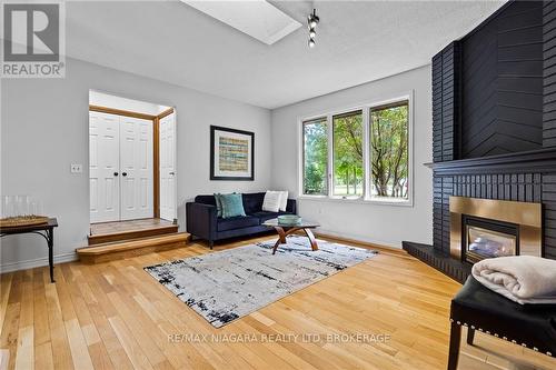 404 Line 2 Road, Niagara-On-The-Lake, ON - Indoor Photo Showing Living Room With Fireplace