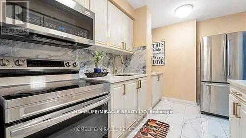 122 - 3455 Morning Star Drive, Mississauga (Malton), ON - Indoor Photo Showing Kitchen