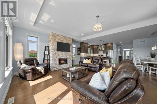 132 Cherrywood Parkway, Greater Napanee, ON - Indoor Photo Showing Living Room With Fireplace