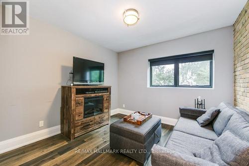 65 Coady Avenue, Toronto (South Riverdale), ON - Indoor Photo Showing Living Room With Fireplace