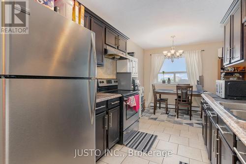 501 - 283 Fairway Road N, Kitchener, ON - Indoor Photo Showing Kitchen With Double Sink