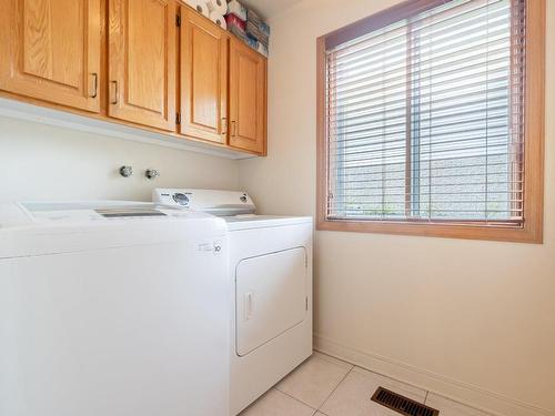 Salle de lavage - 69 Rue Du Chambertin, Kirkland, QC - Indoor Photo Showing Laundry Room