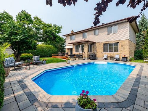 Cour - 69 Rue Du Chambertin, Kirkland, QC - Outdoor With In Ground Pool With Deck Patio Veranda With Backyard With Exterior