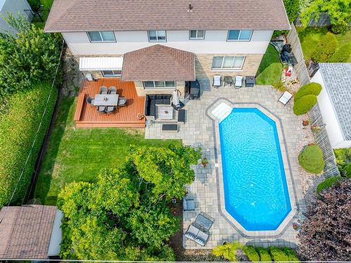 Photo aÃ©rienne - 69 Rue Du Chambertin, Kirkland, QC - Outdoor With In Ground Pool