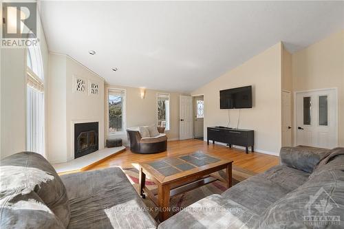 1310 Lacroix Road, Clarence-Rockland, ON - Indoor Photo Showing Living Room With Fireplace