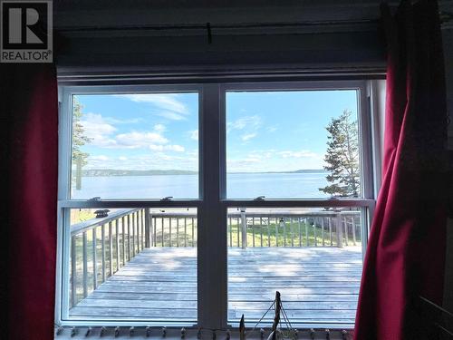 64 Main Street, Point Of Bay, NL - Indoor Photo Showing Other Room With Body Of Water