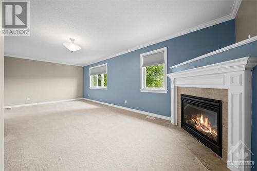 58 Queenston Drive, Ottawa, ON - Indoor Photo Showing Living Room With Fireplace