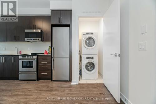 604 - 212 King William Street, Hamilton (Beasley), ON - Indoor Photo Showing Laundry Room