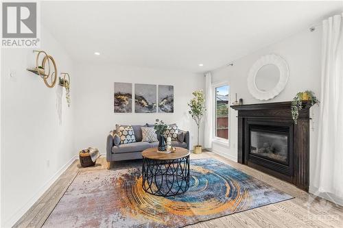 826 Clearbrook Drive, Ottawa, ON - Indoor Photo Showing Living Room With Fireplace